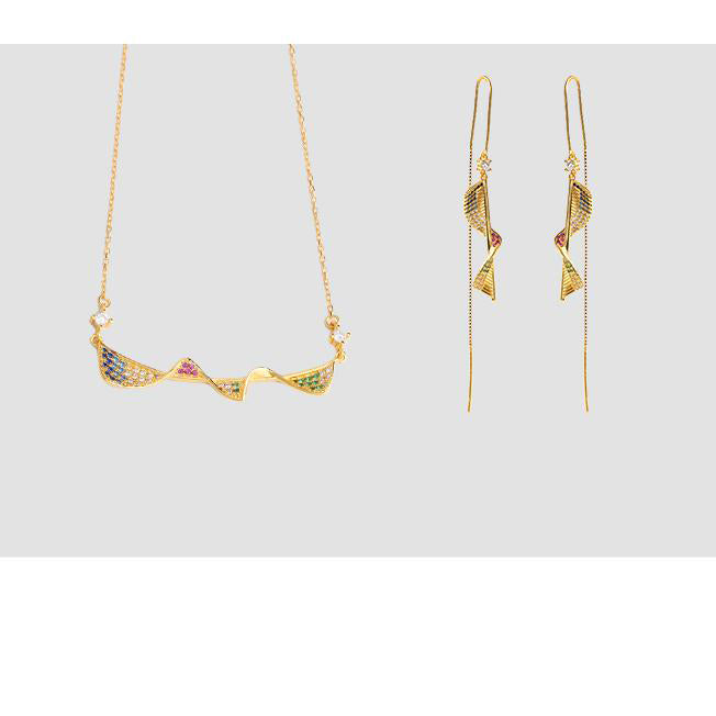 Artisan Tibetan sterling silver earrings representing prosperity, grace, and longevity.