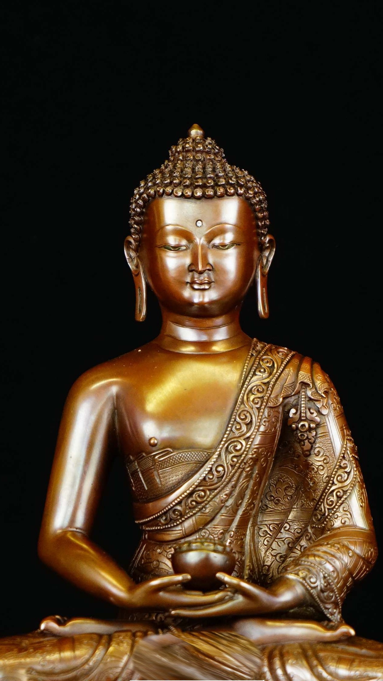 "Handcrafted copper Buddha statue of Amitabha, adorned with rich mineral painting. A spiritual piece of art, ideal for meditation and home décor." 
