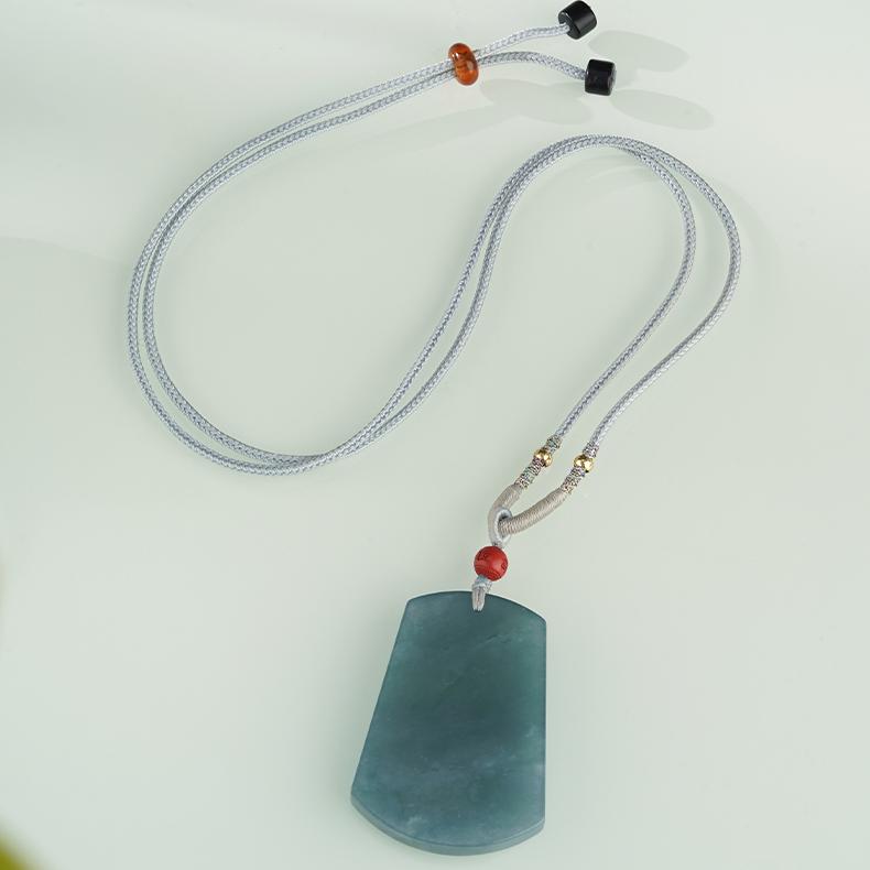Natural handcrafted blue jade necklace reflecting tranquility and spiritual protection.