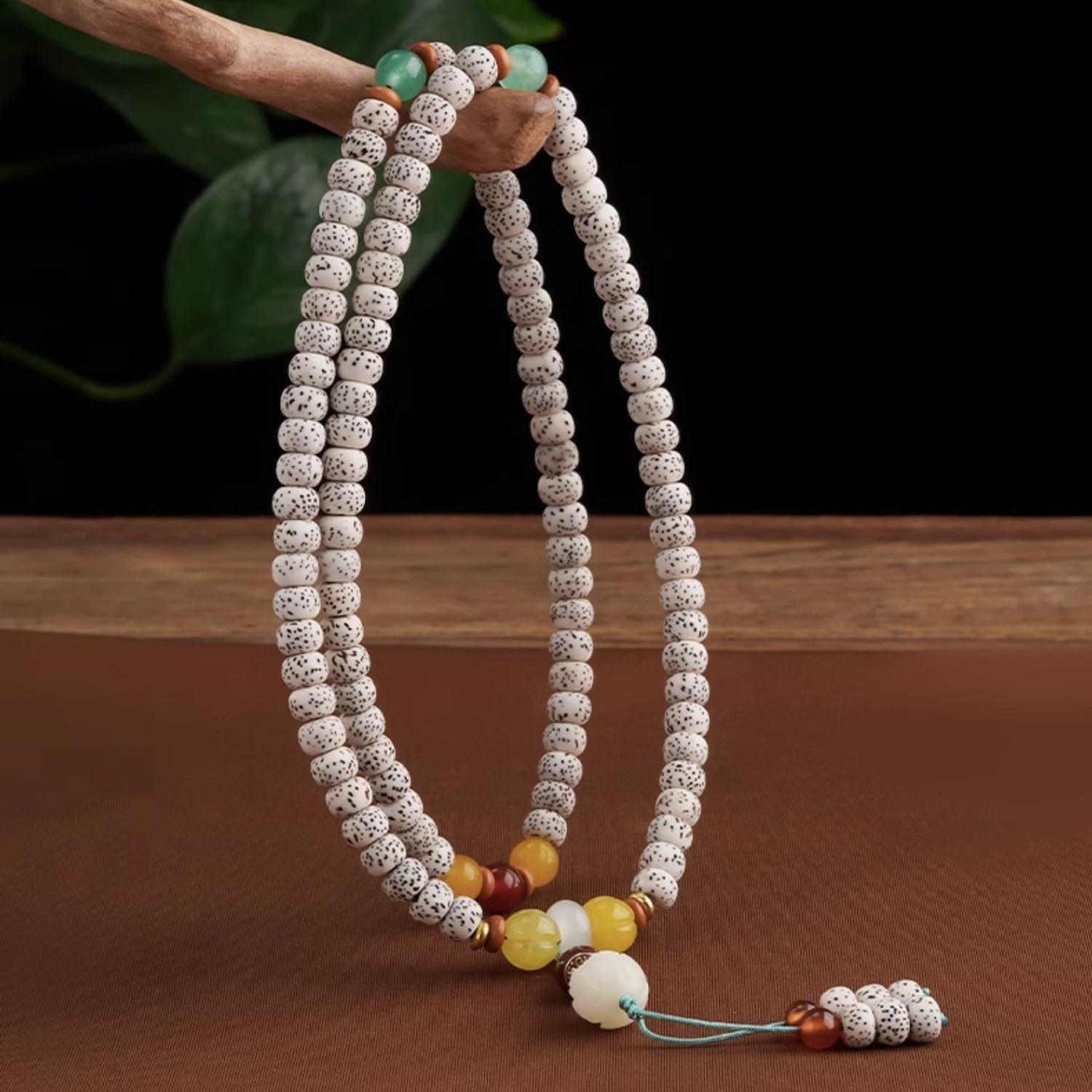 Handmade Tibetan Buddhist star-moon Bodhi mala necklace with carnelian, agate, chalcedony, and olive-pit beads.