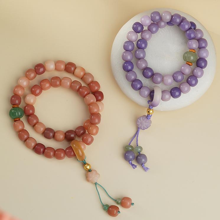 Zhaohongyan Bodhi bracelet designed with 10x9 mm beads, Aventurine spacers, and silver mantra bead in artisan beading style.