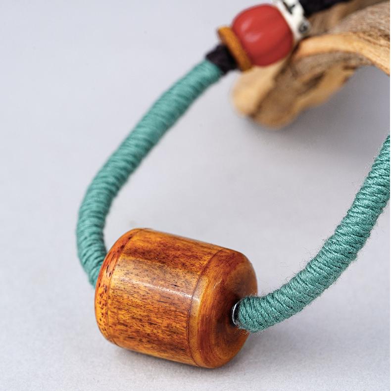 Handmade Tibetan Necklace with Bone Barrel Beads, Glass, and Silver