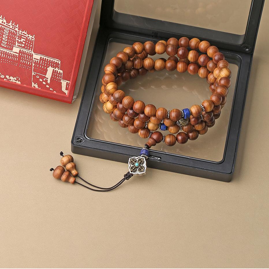 Handcrafted cypress wood prayer necklace for meditation, chanting, and spiritual rituals.