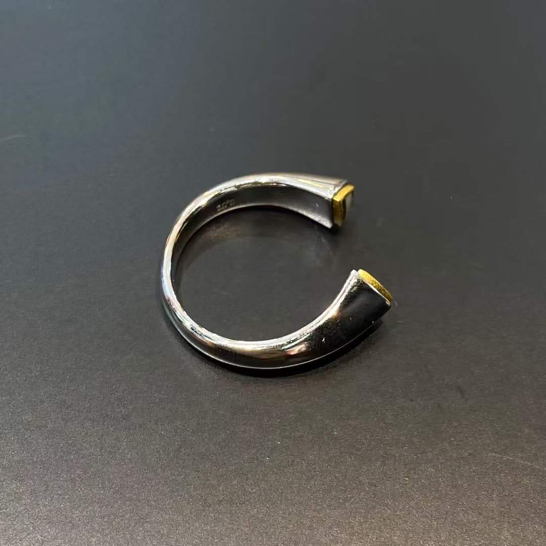 Handcrafted Tibetan Dzi ring in sterling silver, combining spiritual symbolism and fine craftsmanship.