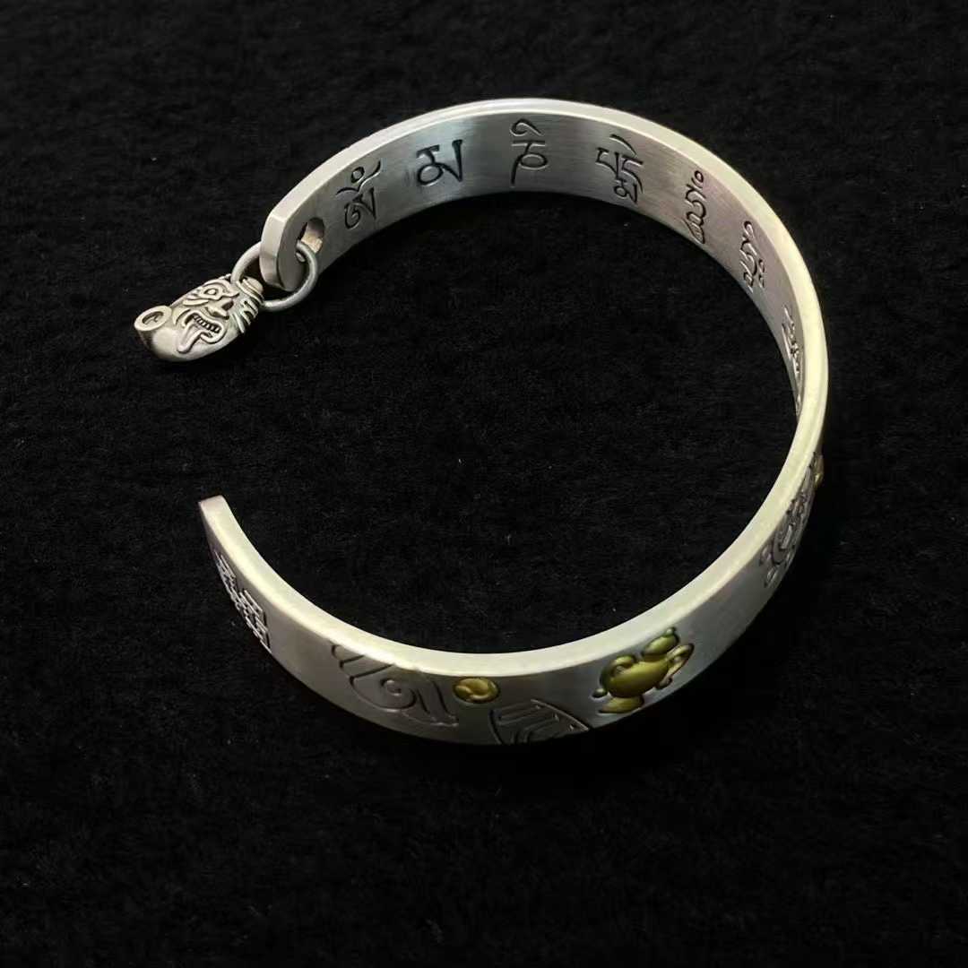 Artisan-made Tibetan Buddhist Eight Treasures bracelet in premium S925 silver.