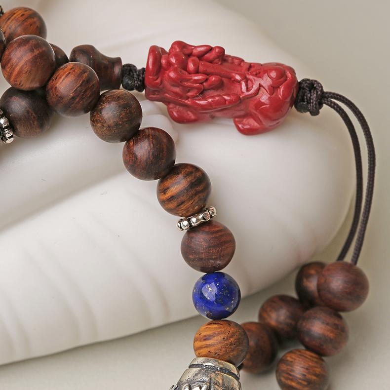 Handmade Tibetan mala necklace with Huanghuali wood, lapis lazuli, cinnabar beads, and 925 silver craftsmanship