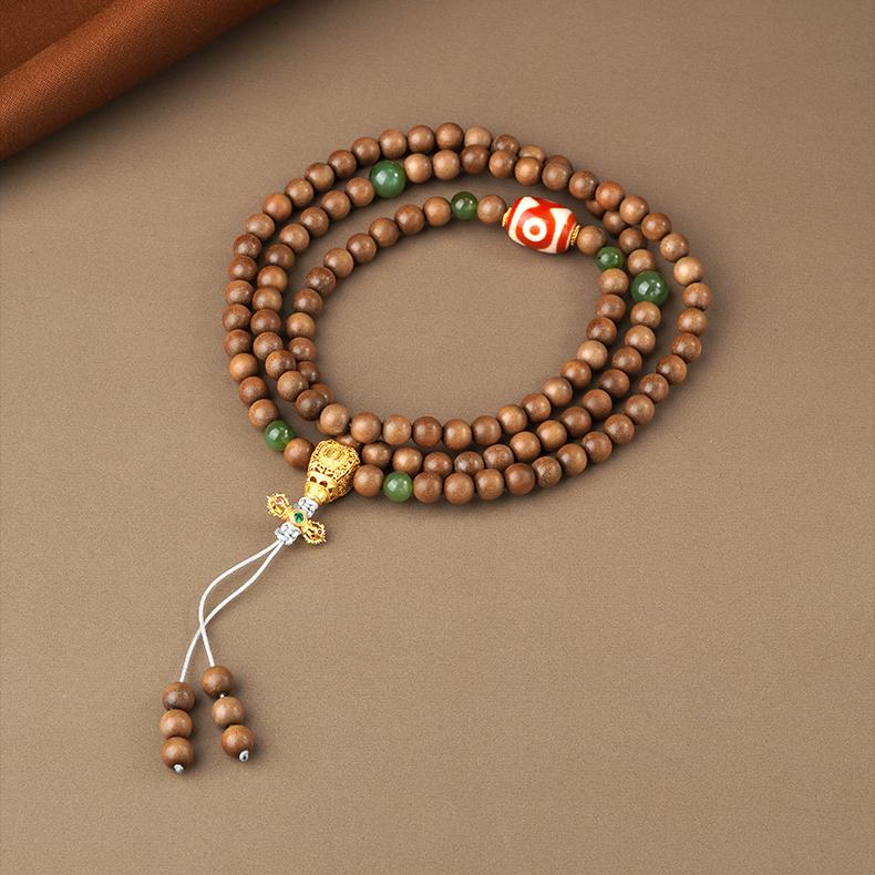 Tibetan-Buddhist Laosandal mala necklace with jade, agate Dzi bead, and silver spacers, handcrafted spiritual jewelry
