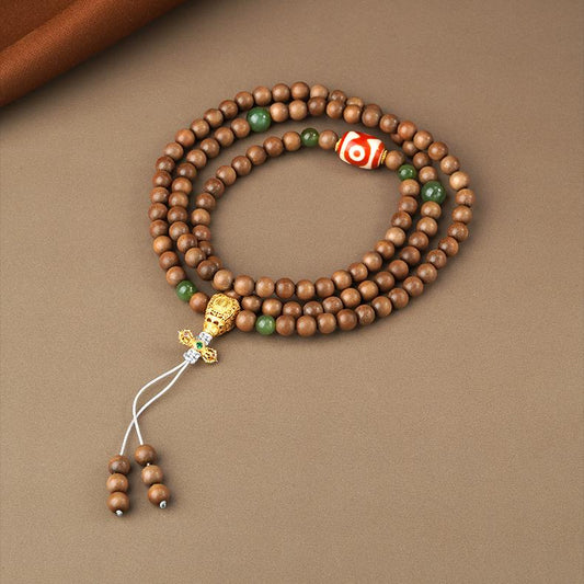 Tibetan-Buddhist Laosandal mala necklace with jade, agate Dzi bead, and silver spacers, handcrafted spiritual jewelry