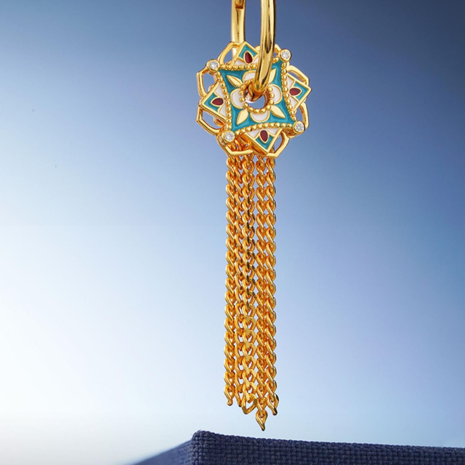 "Artisan-crafted 925 silver Lian Kai Fan Hua earrings with delicate lotus flower and tassels, representing spiritual flourishing and beauty."