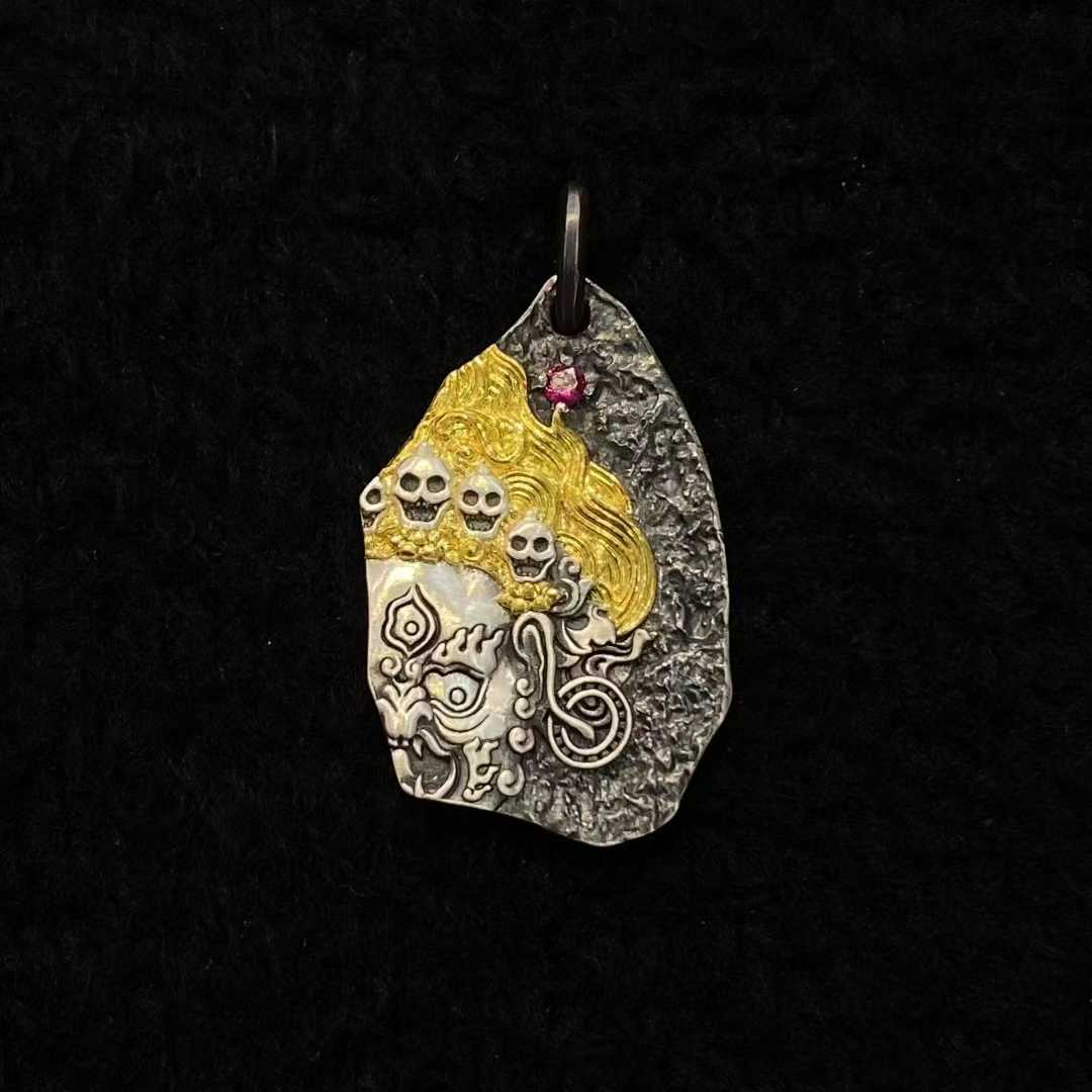 Handcrafted Tibetan Buddhist Mahakala pendant made of pure gold and silver with fine inlay craftsmanship.