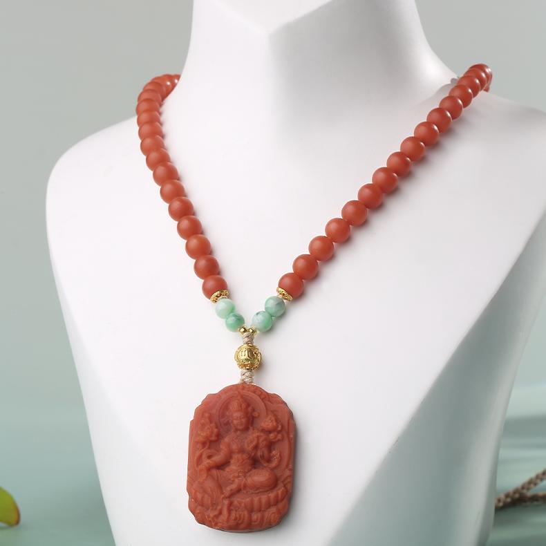 Tibetan Buddhist Tara goddess necklace with red agate, jade, and silver accents, for spiritual energy.