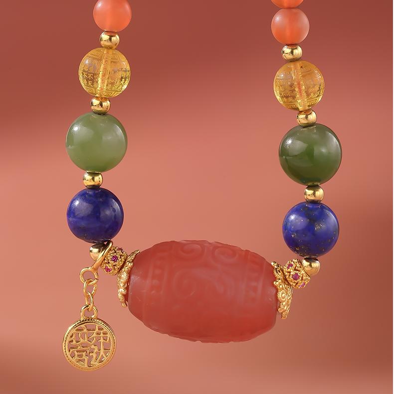 Artisan handmade Tibetan pendant with South Red Agate, Lapis Lazuli, Amber, and Hetian Jade.