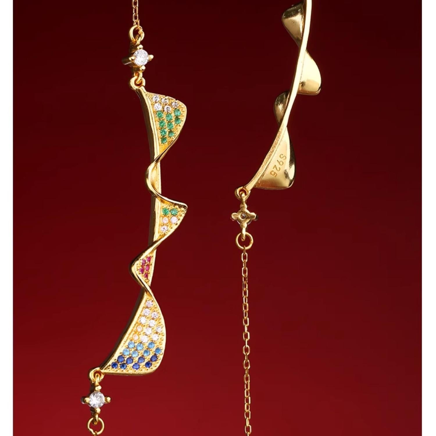 Sterling silver Ruyi charm pendant inspired by Tibetan Buddhist jewelry traditions for peace and success.