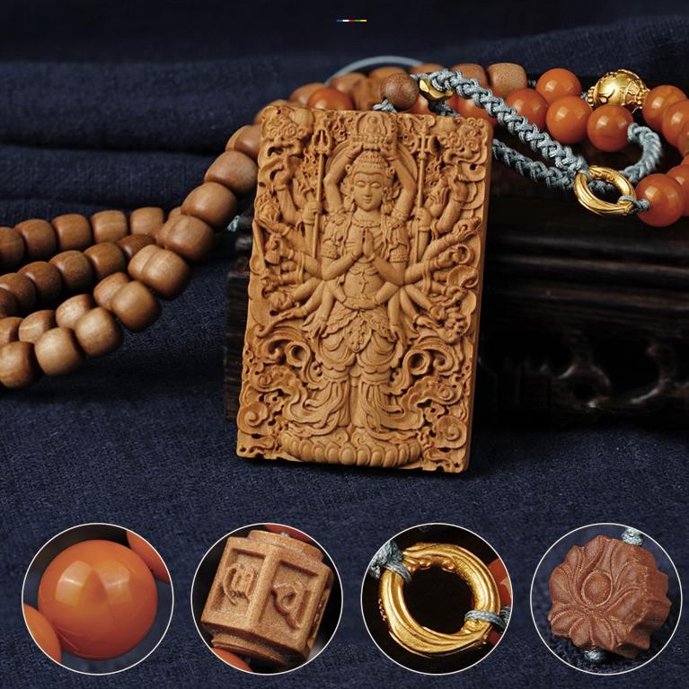 Tibetan Buddhist necklace with sandalwood beads engraved with the Six-Word Mantra, enhancing spiritual energy.