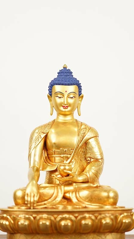 Gilded Shakyamuni Buddha statue art in Tibetan Buddhist style, classic Tibetan Buddhist statues