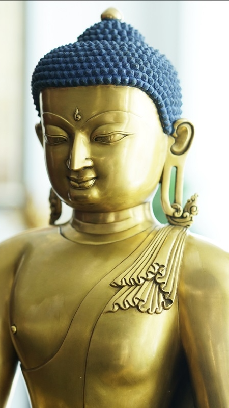 Gilded Tibetan Buddhist Buddha statue for shrine and altar, handcrafted Shakyamuni Buddha representing compassion, peace, and enlightenment