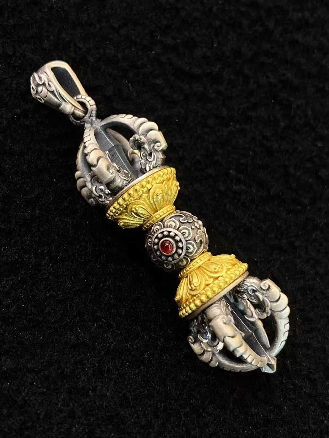 Sterling silver Vajra talisman pendant crafted in Tibetan Buddhist style.