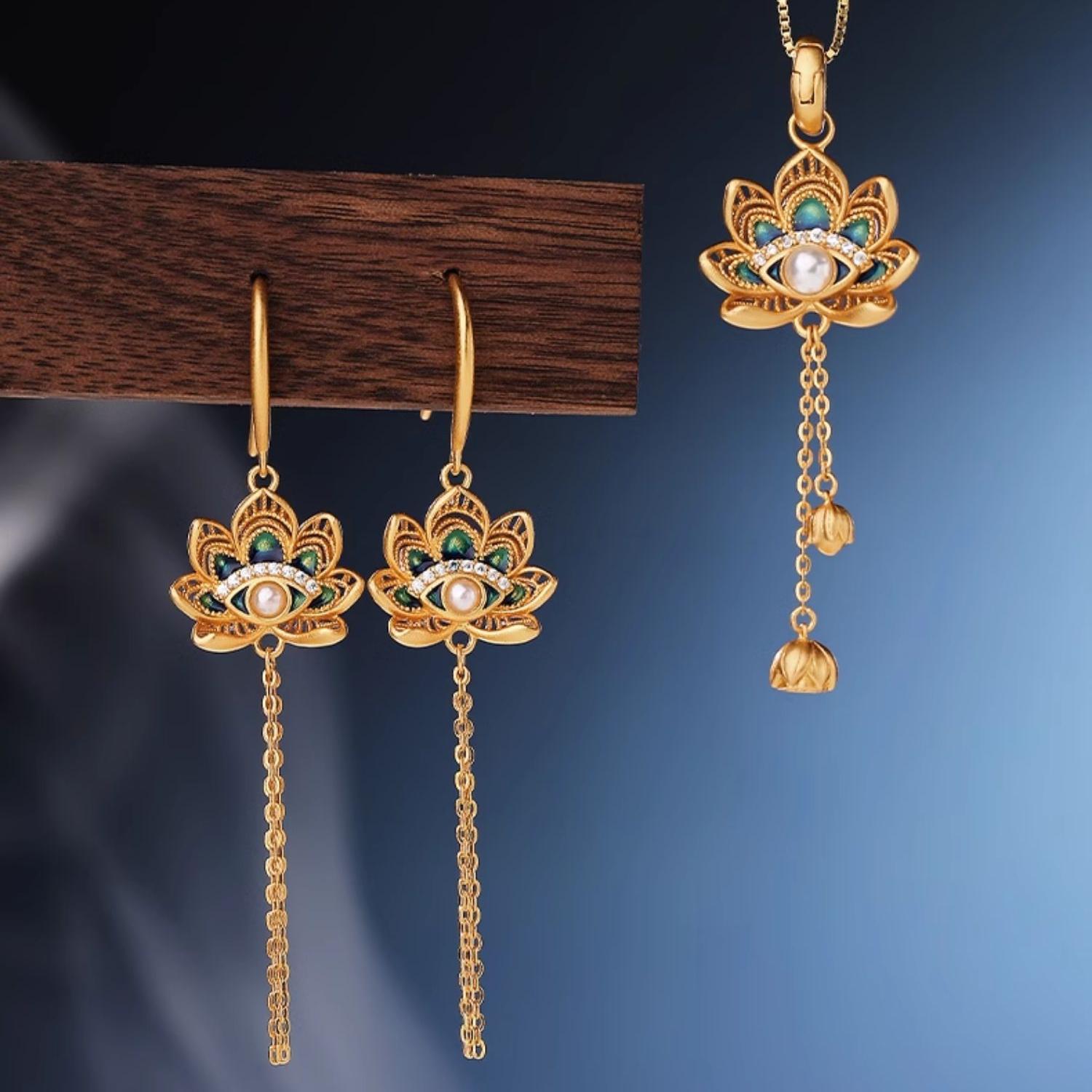 Handmade silver and shell pearl earrings with Tibetan Buddhist artistry and spiritual meaning.