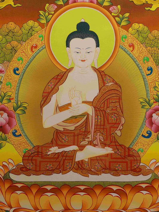 Traditional Tibetan Thangka painting of Shakyamuni Buddha, handmade with mineral pigments.