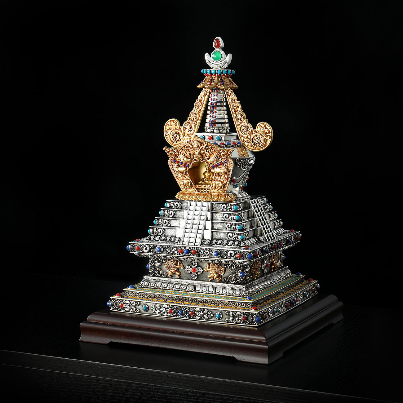 Handcrafted Tibetan Buddhist Heaven Descent Stupa made of brass and white bronze with gold and silver gilding.