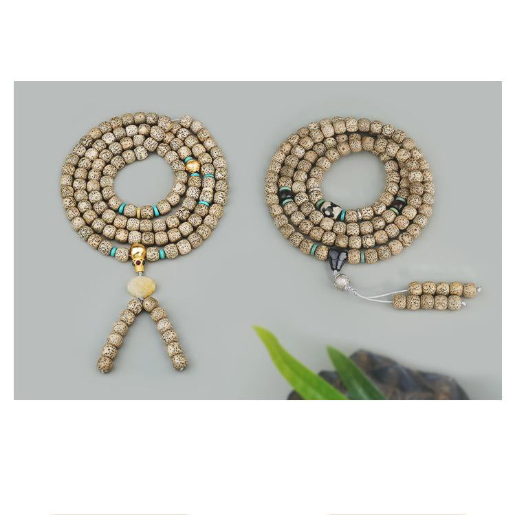 Hongyi Tibetan Buddhist necklace featuring amber, turquoise, and silver craftsmanship