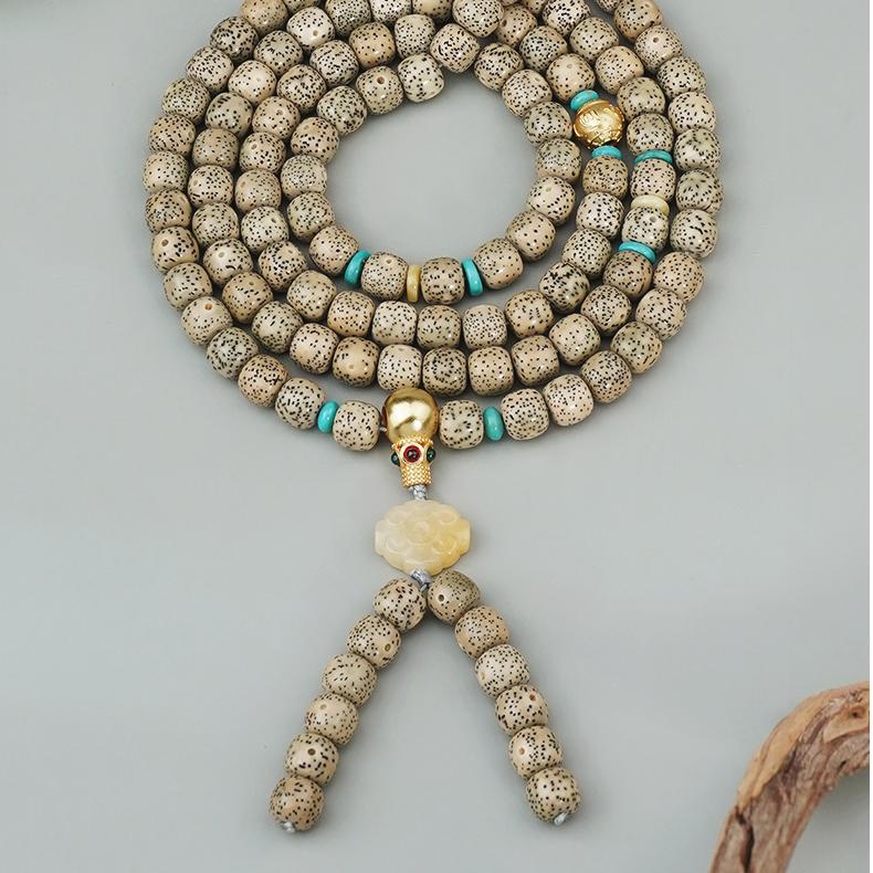 Tibetan Buddhist Bodhi mala with turquoise and amber for balance and protection