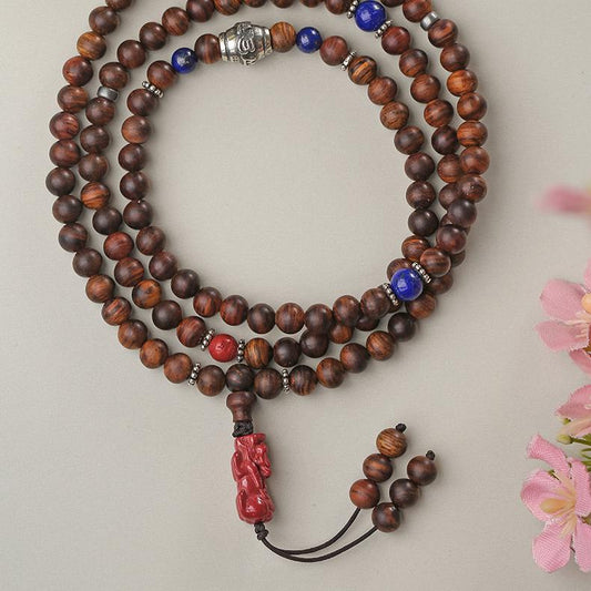 Tibetan-Buddhist Huanghuali mala necklace with lapis lazuli, cinnabar Pixiu, and silver accents, handmade meditation jewelry
