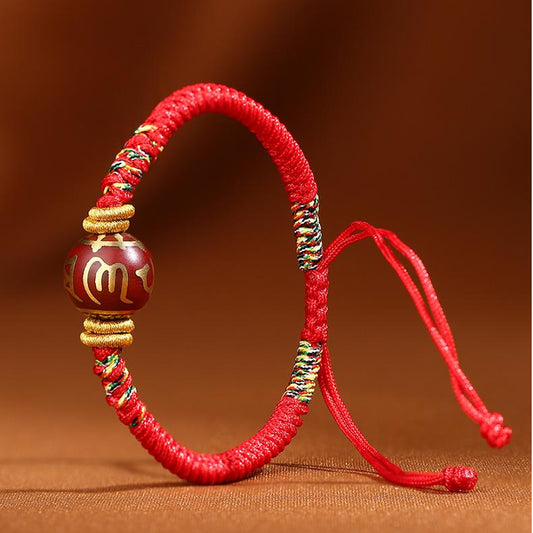 Tibetan-Buddhist incense ash bead bracelet with engraved mantra and red adjustable cord