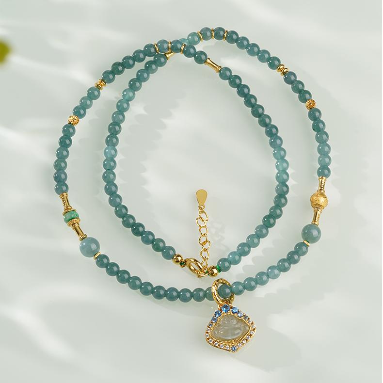 Handcrafted Tibetan Jade Buddha Necklace made with natural jade and s925 silver.