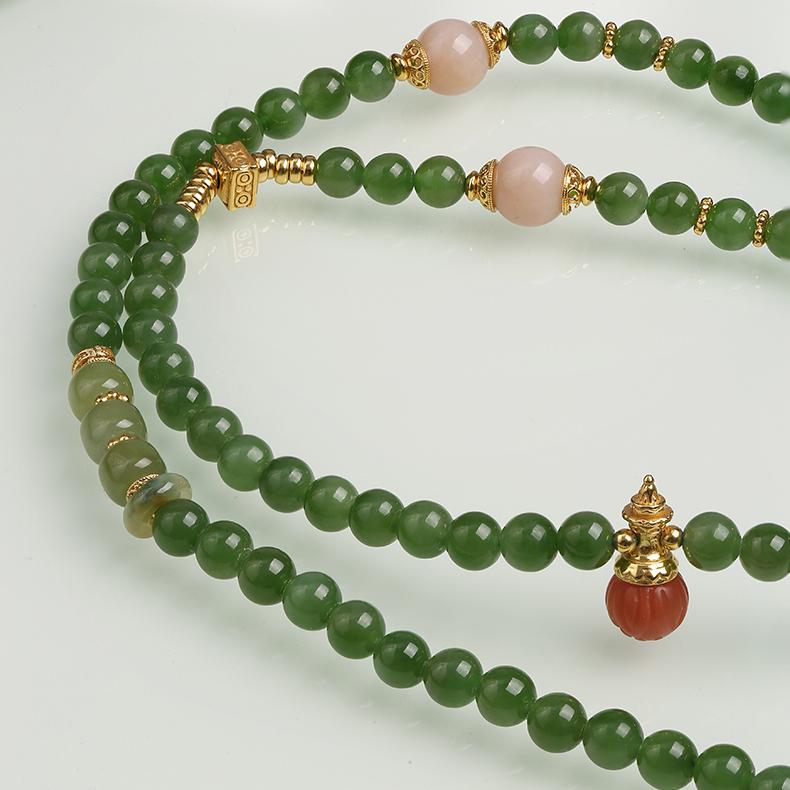Tibetan thangka-style jade and amber bead necklace combining green jade, jadeite, and red agate for balance and strength.
