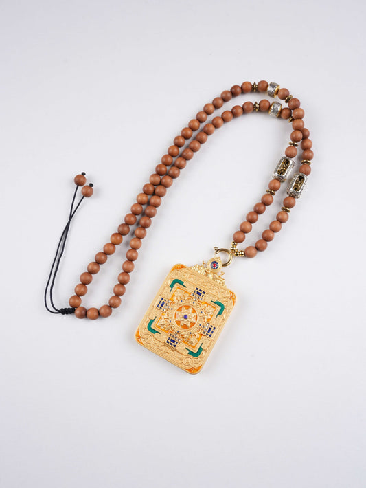 Mini Dzambhala Tibetan Thangka painting crafted with mineral pigments for wealth and protection.