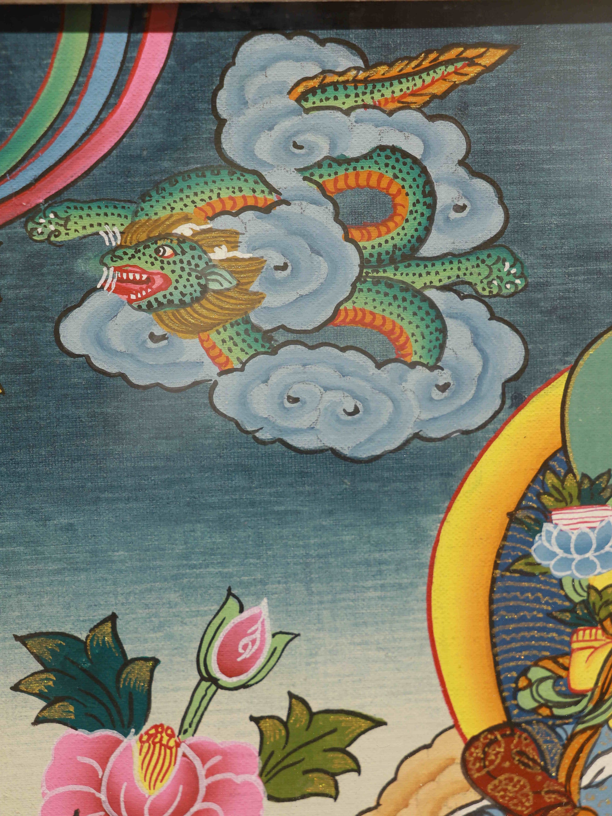 Elegant hand-painted Tibetan Buddha art Thangka of Yellow Jambhala, embodying the blessings of wealth and spiritual harmony.