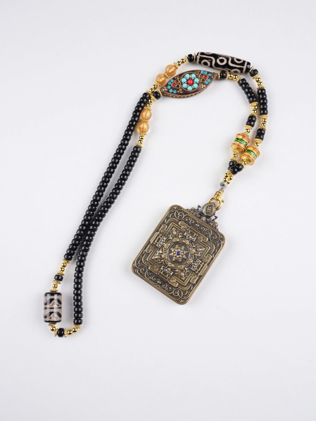 Yellow Jambhala Wealth Deity Tibetan Thangka painting pendant for success, generosity, and spiritual abundance.