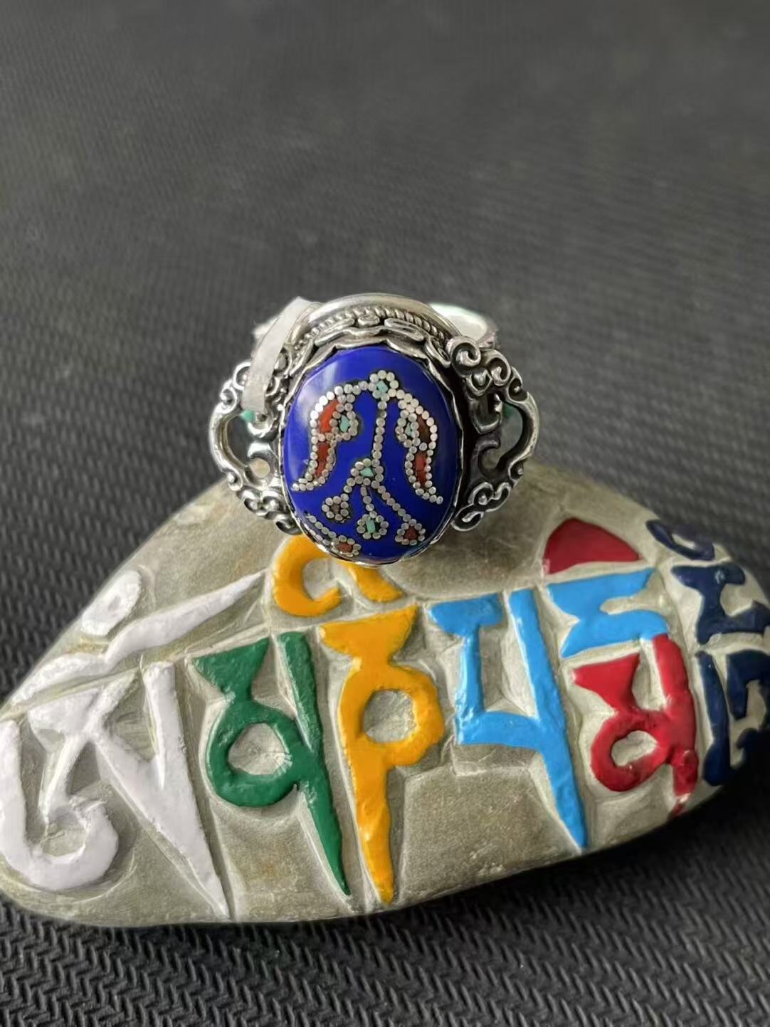Intricate 925 silver lapis lazuli ring with hand-painted carvings, inspired by Tibetan Buddhist Jewelry Culture and royal palace jewelry art.