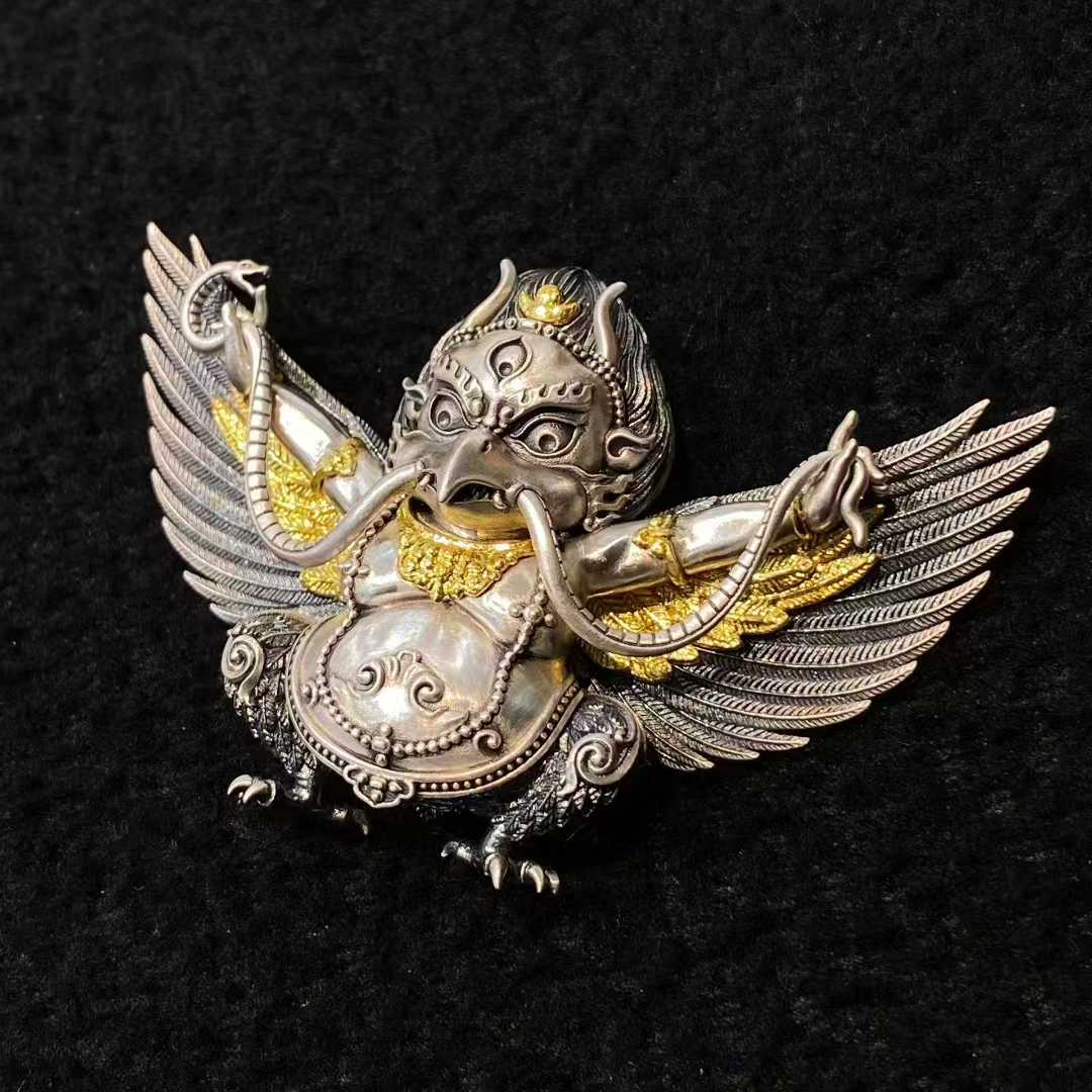 S925 Au990 Garuda bird pendant in Tibetan Buddhist Jewelry Culture style, showcasing fine jewelry art craftsmanship and spiritual symbolism.