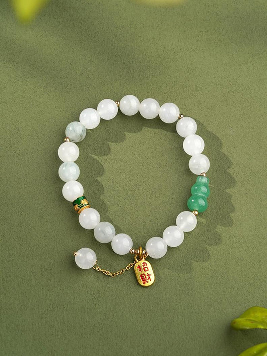 A complete Golden Silk Jade gourd mala bracelet designed for meditation practice. This sacred jewelry art piece features 108 gourd-shaped beads, perfect for mantra recitation and spiritual practice.