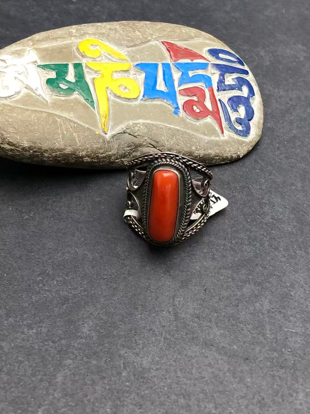 Artisan-crafted 925 silver red resin ring inspired by Tibetan Buddhist Jewelry Culture, featuring vintage jewelry art for spiritual protection.
