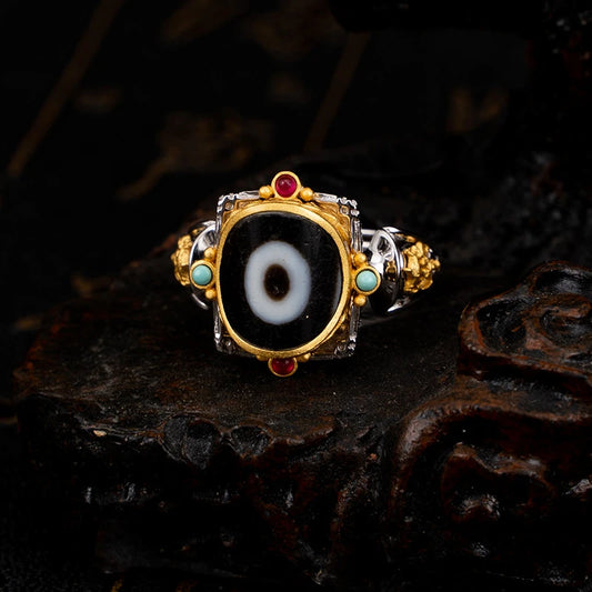 Hand-carved silver One-Eye Umbrella ring from Tibetan Buddhist Jewelry Culture, showcasing intricate jewelry art and traditional handcraft.