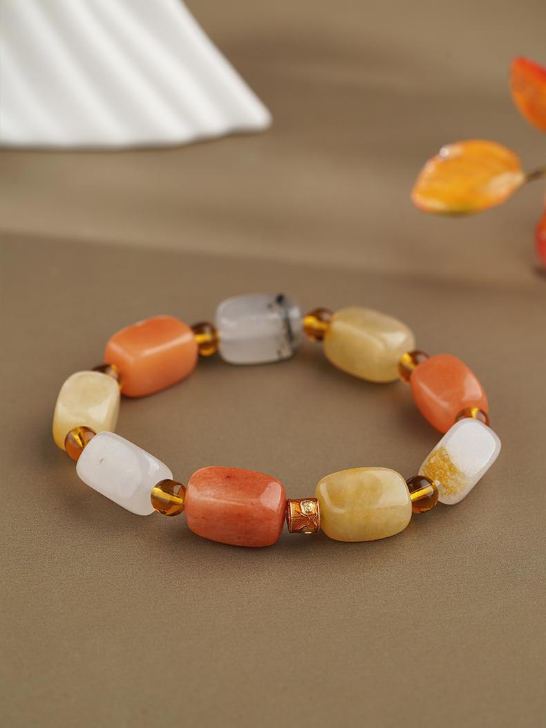 Natural square Quartzite Jade bracelet showcasing unique veining and texture in each handmade bead. This healing energy jewelry art piece harnesses the stabilizing properties of jade to promote emotional balance and spiritual protection in Tibetan Buddhist tradition.