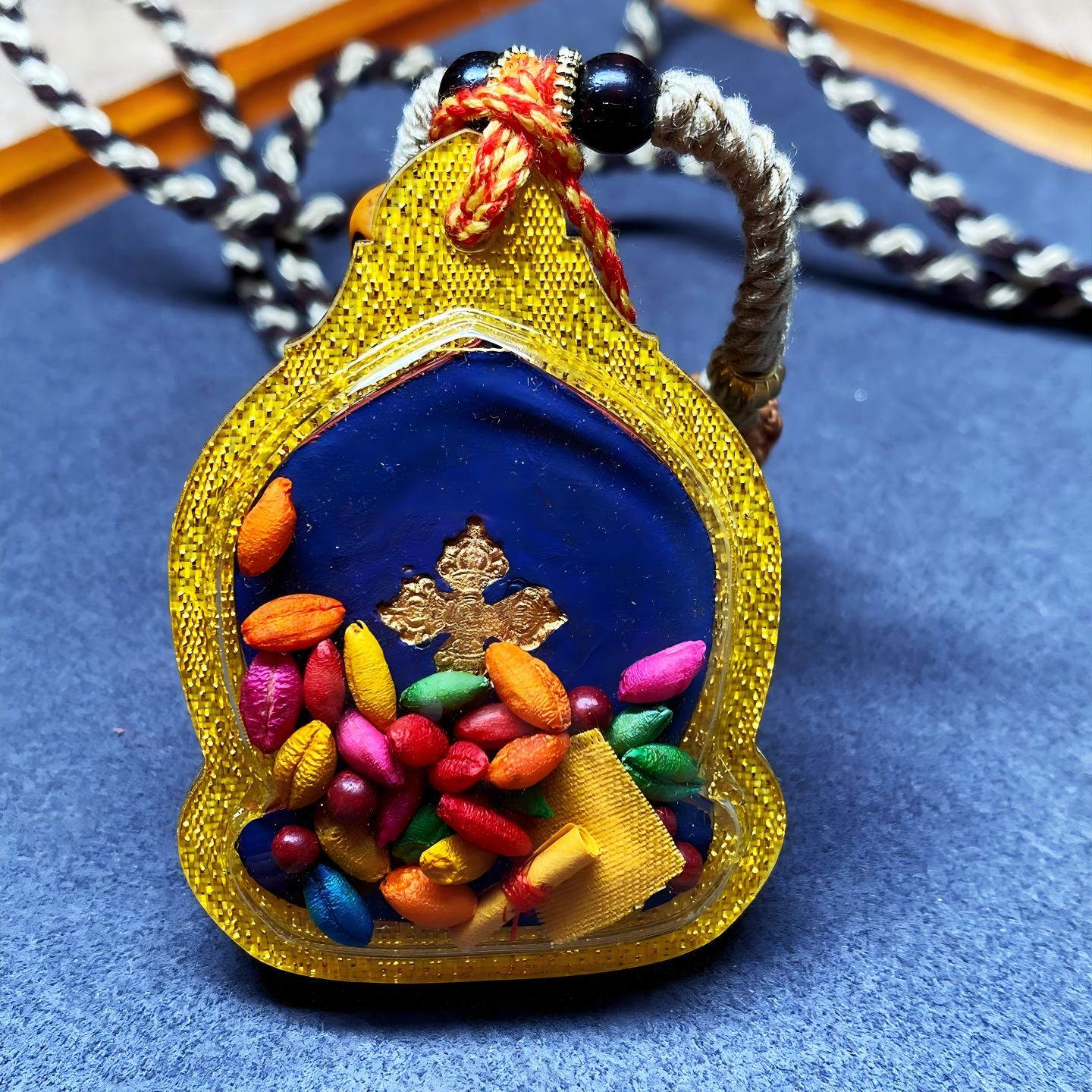 Tibetan Buddhist Jewelry Culture handcrafted Phurba thangka amulet pendant, miniature tsatsa jewelry art for mindfulness, spiritual strength, and protection