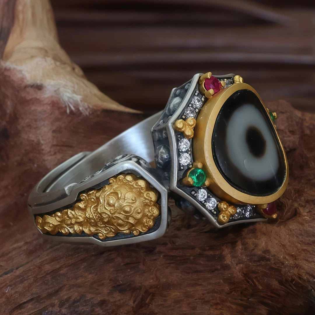 Pure handmade silver Shitoulin Guardian One-Eye ring reflecting Tibetan Buddhist Jewelry Culture, highlighting intricate jewelry art techniques and sacred symbolism.