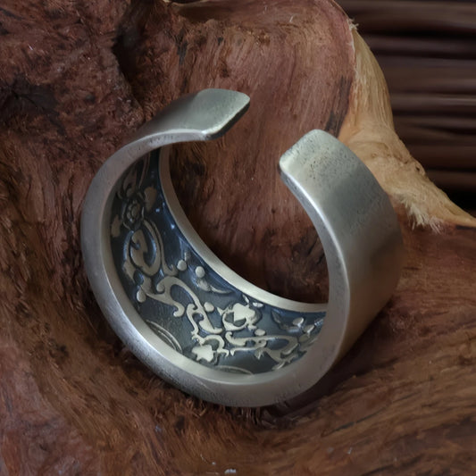 Hand-painted silver Green Tara Eye ring inspired by Tibetan Buddhist Jewelry Culture, a jewelry art piece symbolizing compassion and protection.