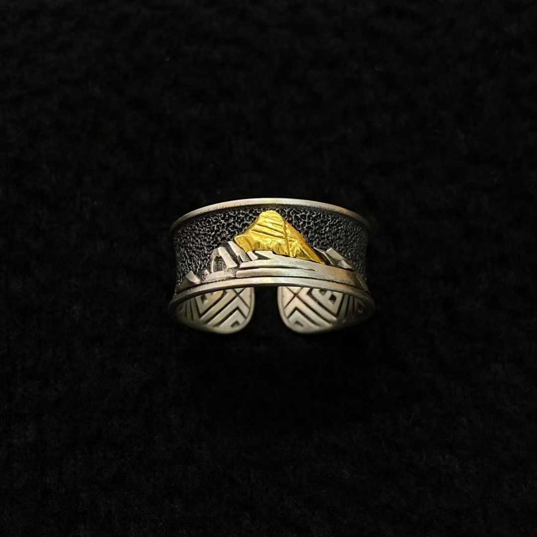 Handmade Tibetan Kailash ring, gold and silver inlay with sacred design.