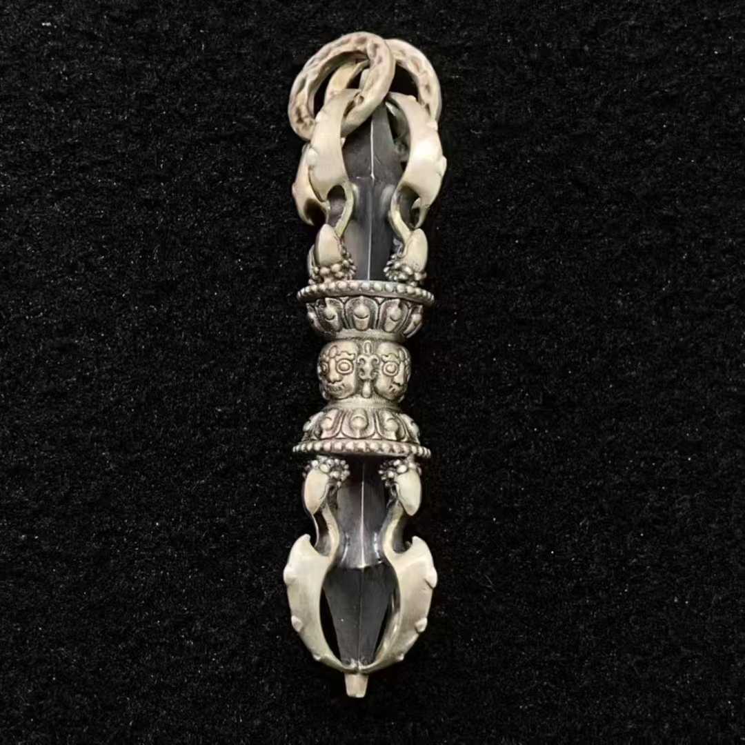 Handcrafted Tibetan-Buddhist silver Vajra Axe pendant for spiritual wear.