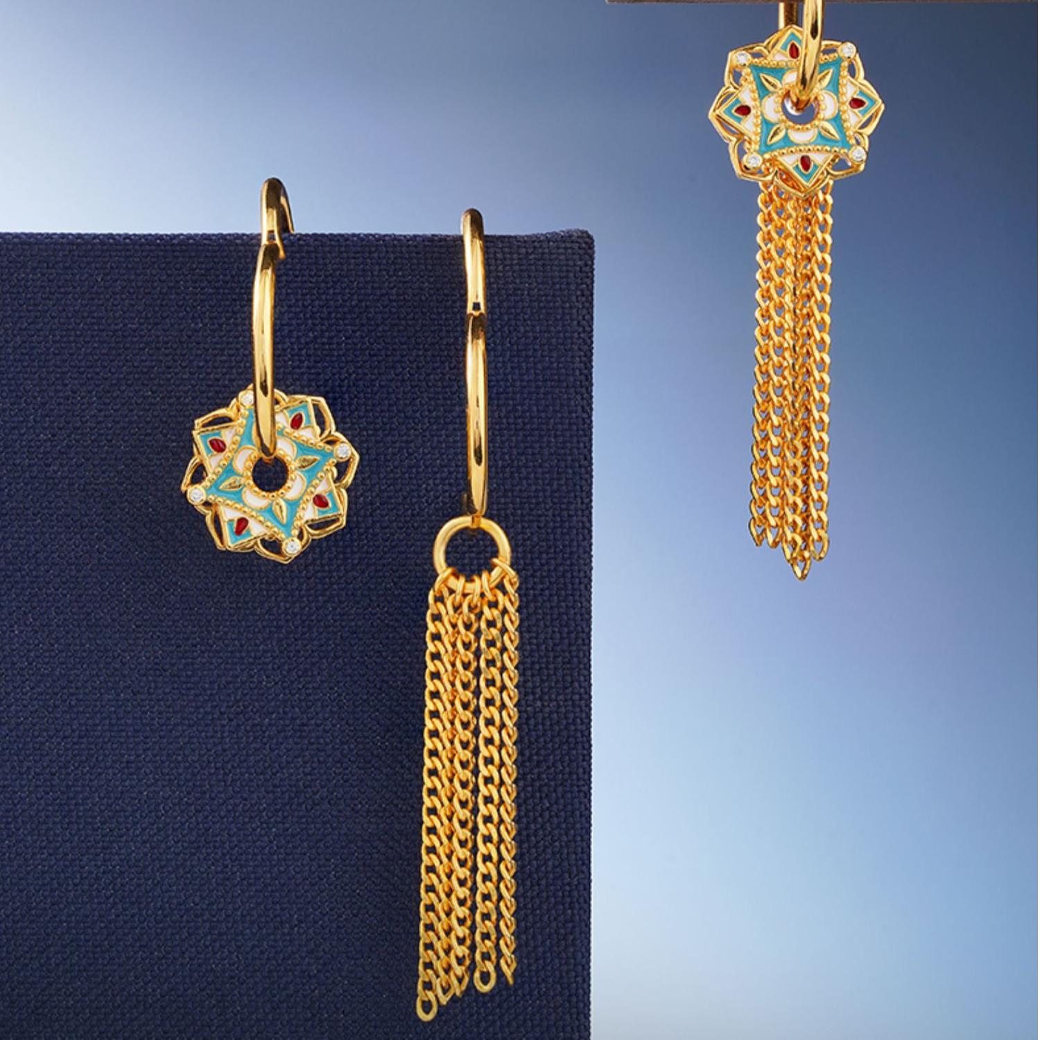 "Tibetan Buddhist-inspired 925 silver earrings with a hollow lotus flower and silver tassels, embodying the beauty of spiritual awakening and harmony."