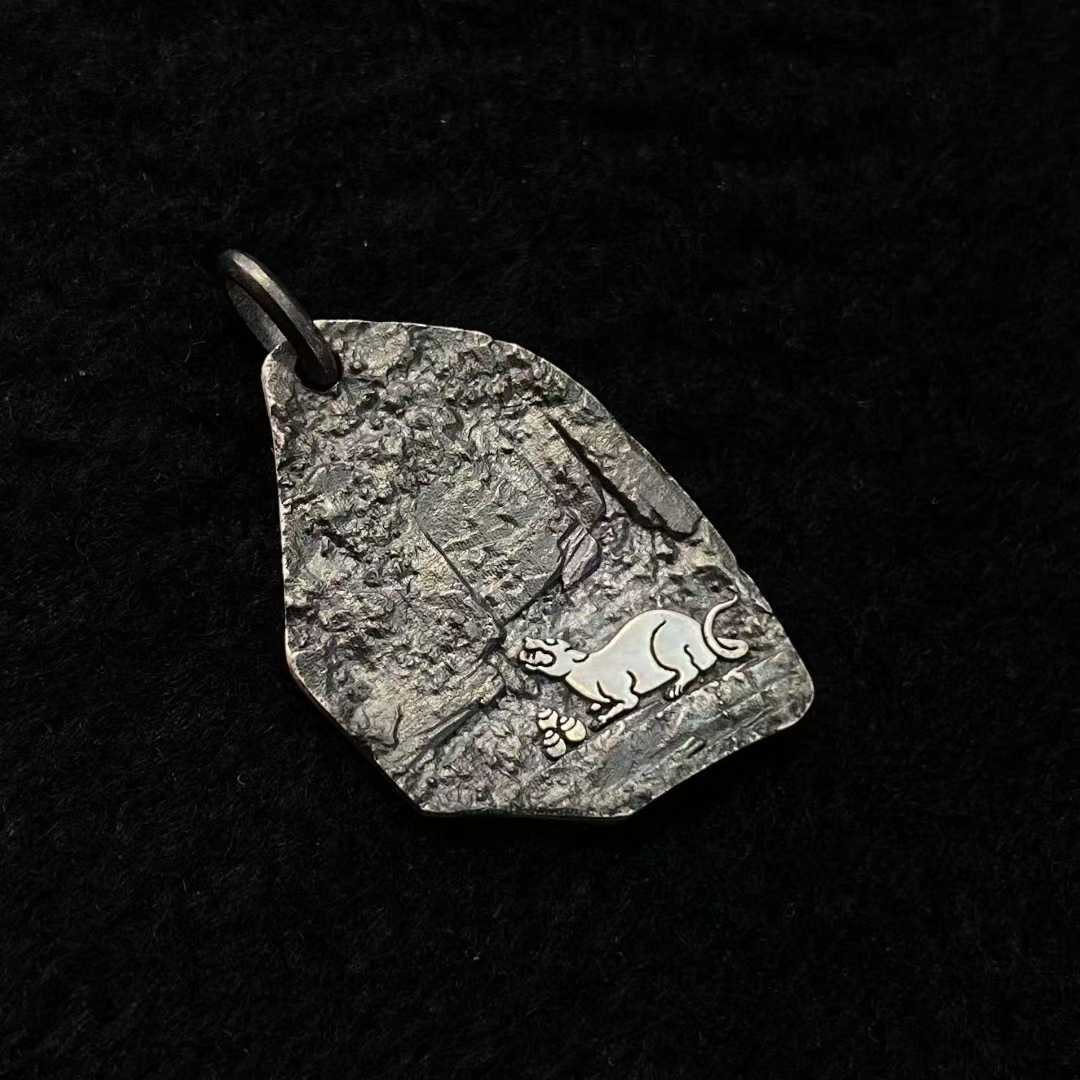 Tibetan Buddhist Yellow Jambhala wealth pendant with gold and silver artistry, fully handmade.