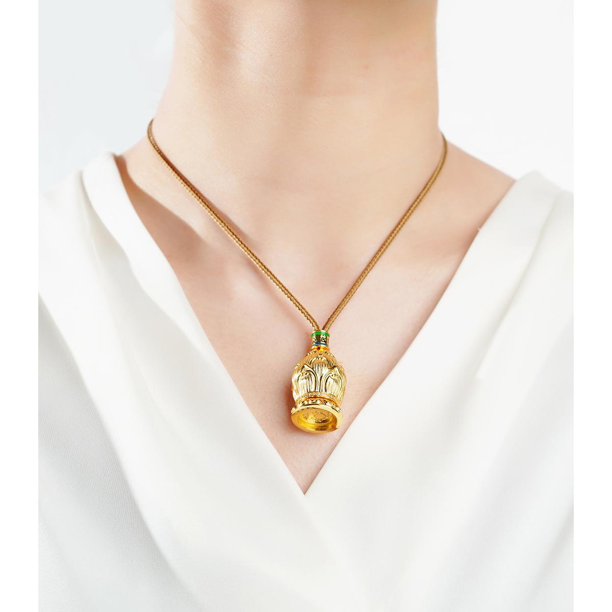 925 silver and gold-plated lotus pendant symbolizing prosperity and protection.