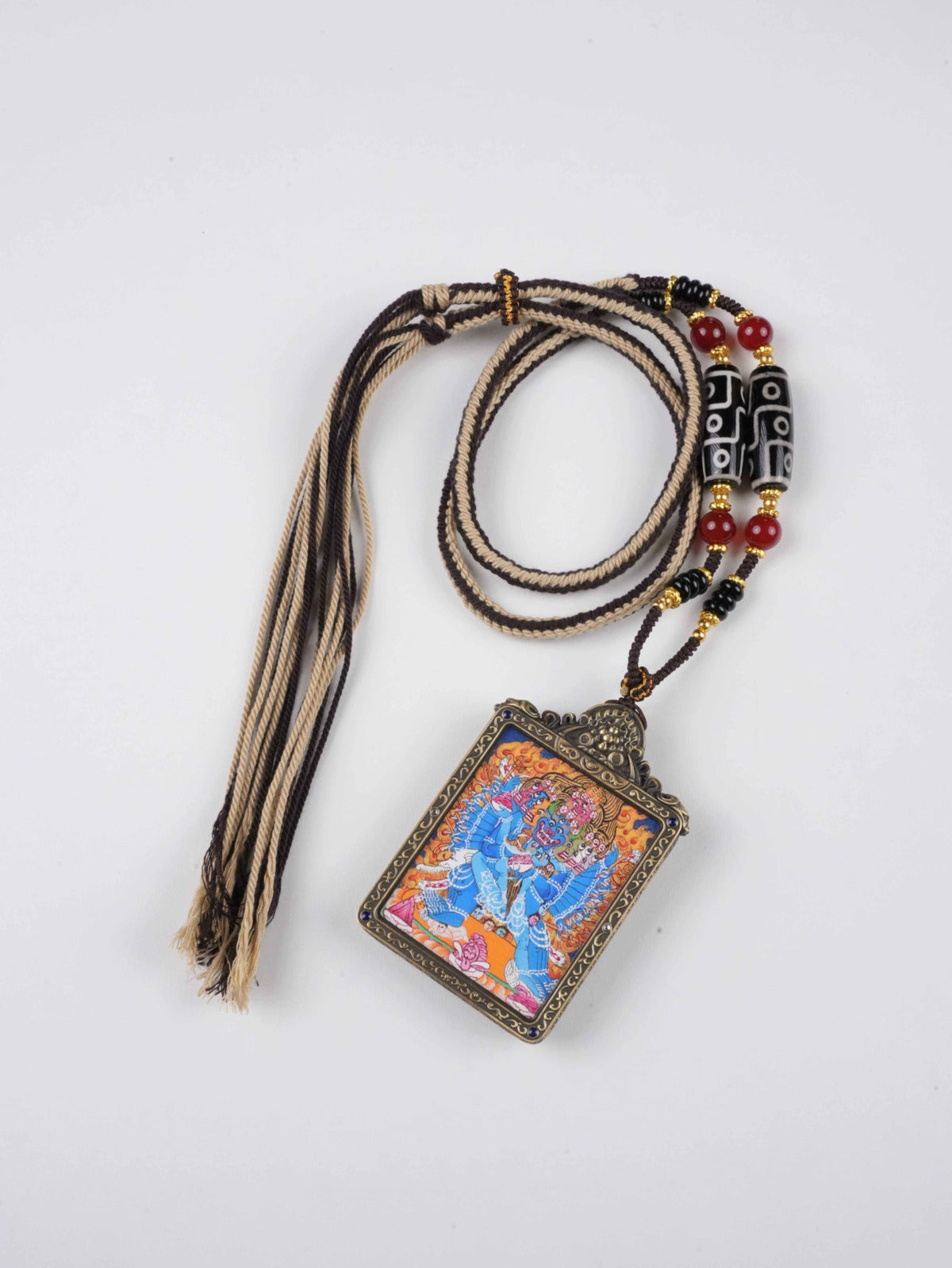 Sacred Tibetan Buddhist Gau amulet depicting Mahasamvara, the fierce tantric deity for protection.