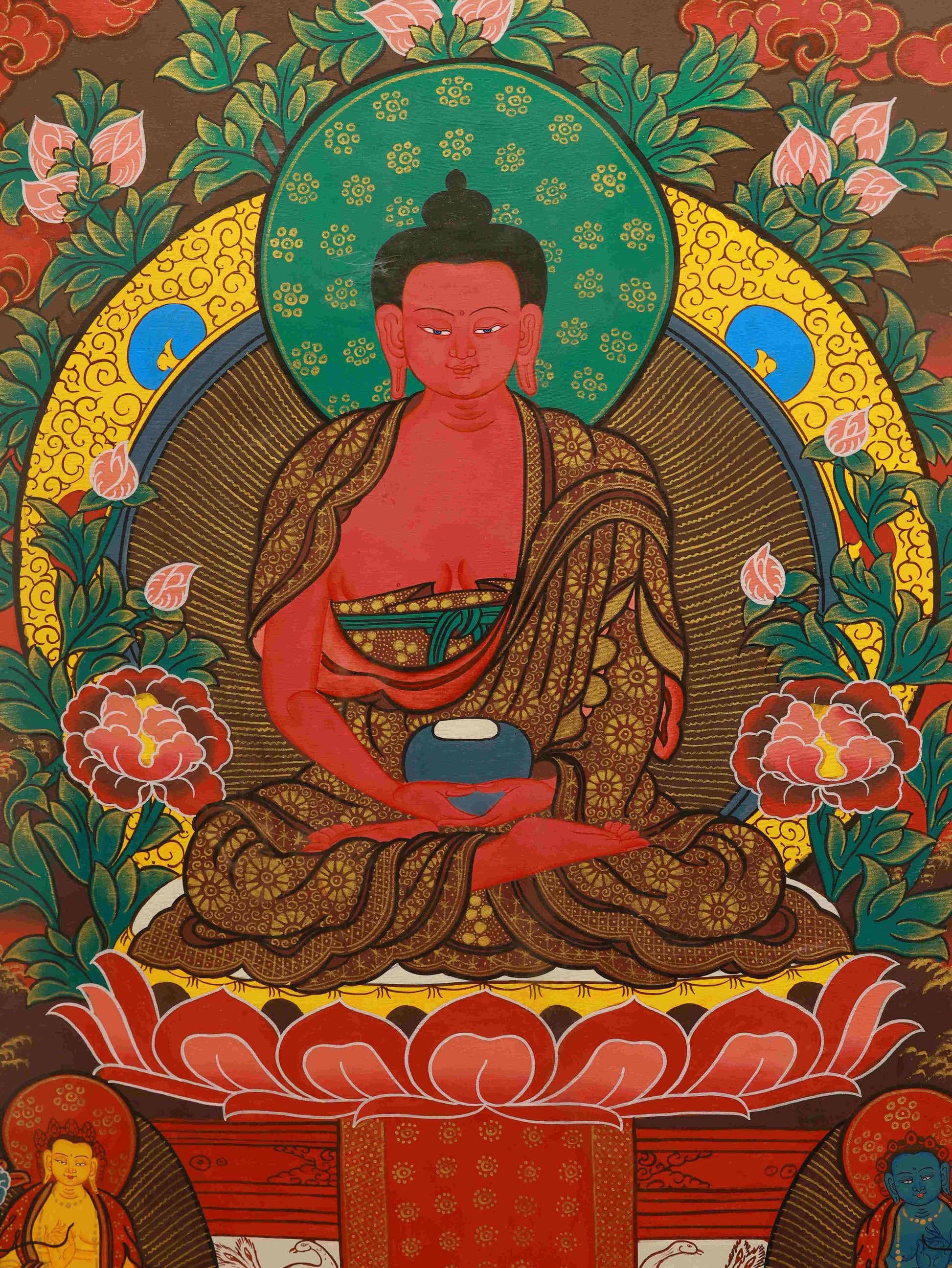 Handcrafted Tibetan Thangka painting using mineral pigments, featuring Vairochana Buddha in vibrant detail.
