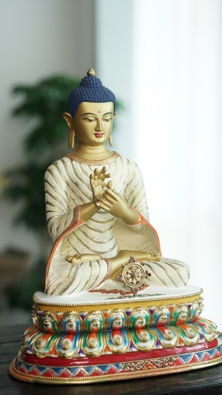 Handcrafted Tibetan Buddhist Maitreya Buddha statue finished with traditional mud-gold and mineral pigments, symbolizing joy, compassion, and future enlightenment.